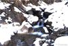 a semi frozen river on har ki dun trek